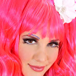 Pic of Kinky uniform doll in wig Candy Sweet is playing with the big and hard dildo