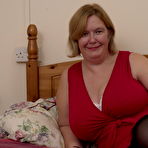 Pic of Large British mature lady with big natural tits getting dirty