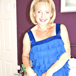 Pic of Busty mature slut in stockings show her aged holes at Michelle's Nylons