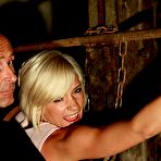 Pic of Blonde babe suffers in dark dungeon