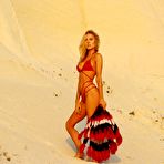 Pic of Kimberley Garner in red bikini in desert