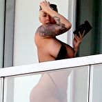Pic of Amber Rose flashing her ass on a balcony