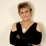 Pic of Mature slut playing with her lollypop