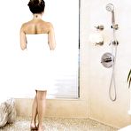 Pic of Asian girl Daisy Summers slides her robe down and shows the milky white ass