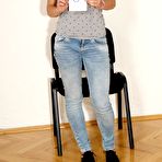 Pic of Absolutely naked bimbo Candy Sweet is stretching widely uncovering the clean shaved beaver