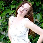 Pic of Natural redhead girl Holly Hansen does outdoor striptease and demonstrates her bush