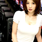 Pic of Stacked gravure idol babe plays the slots in her skimpy bikini