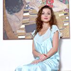 Pic of Teen brunette with beautiful eyes Alyssa A removes her dress in the bed