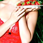 Pic of Sexy redhead chick Violla A takes off her red lingerie and poses outdoor