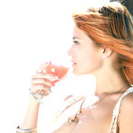 Pic of Redhead gadget Violla A is demonstrating her perfect big titties under the skies