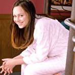 Pic of Charming babe relaxing after a shower creaming her nude body and teasing cute tits and hot pussy