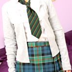 Pic of Shy schoolgirl Emma B in snow white stockings strips naked and palms her pussy