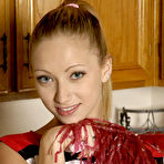 Pic of Cheerleader Adel Sharpe shows her tiny boobs and then toys her snatch in the kitchen