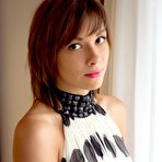 Pic of Shaved little beauty Karin P gropes her dainty tits and spreads her legs wide open.