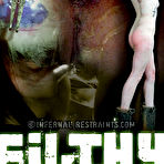 Pic of SexPreviews - Bonnie Day redhead is metal bound in dungeon her legs spread