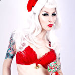 Pic of SHARKYS pale bleached blonde posing as Santa girl