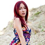 Pic of Redhead teaser Night A lifts her dress u and shows pantieless bottom outdoor