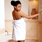 Pic of Charming black bimbo Gana A is not going to hide her shaved pussy under the towel