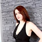 Pic of Busty Redhead in a Sexy Dress