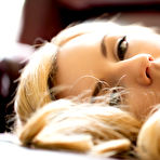 Pic of The black erotic lingerie does not hide the nude charms of lewd blonde Lexi Belle