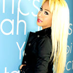 Pic of TaniaQ In Black Coat Teasing Her Lovely Large Cock