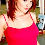 Pic of Red-haired chick next door Fawna Latrisch with hairy pussy bares all on the counter