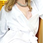Pic of Blonde cutie Maggie A taking off bath robe and showing the shaved pussy hole