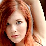 Pic of Hot redhead cutie Mia Sollis is playing fingers and sex stuff over the horny shaved cunt