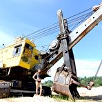 Pic of Naughty babe Foxi Di reveals her fantastic teen shaved pussy outdoors at construction site