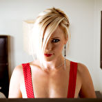 Pic of Stunning blonde in red Lena Nicole slides her dress up and toys her pussy and ass