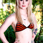Pic of 
      Anna Tyler exposes her sexy curves on the patio
    