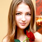 Pic of Little lust filled babe Izabel A takes off her frilly lingerie to show her shaved pussy.