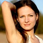 Pic of Beautiful babe Zhanet A has climbed the huge stone to show the nude shaved pussy to the sun
