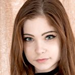 Pic of Emanuelle takes her clothes off off red tights and brown clothing at Teenage Ass Pics
