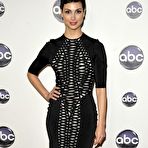 Pic of Morena Baccarin posing for paparazzi in short black dress