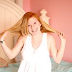 Pic of Lilly Killian takes off her white underwear to show her totally smooth snatch