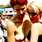 Pic of Blonde Grace Cat and her redhead friend suck and get banged in front of complete strangers