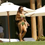 Pic of Busty Daphne Joy sunbathing in green bikini