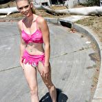 Pic of Hot blonde Sunset Diamond has cum all over her face after BJ on half dozen black shafts