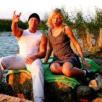 Pic of Innocent blonde teen satisfy two guys outdoors