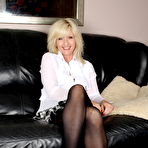 Pic of Blonde mom masturbating on the couch