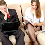 Pic of Lusty secretary in barely black pantyhose seducing guy to play nylons game