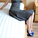 Pic of Amazingly sexy girl in black dress in white dots shows all on the best teen porn photos. (preview pictures)