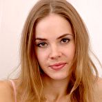 Pic of Slutty teen babe Emanuelle Nubiles bares her garments and shows her tiny tits and pussy