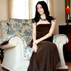 Pic of Zsanett Tormay shows off her sexy, tight body as she sensually poses on the sofa.