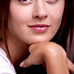 Pic of Veselin bares her slender, tanned body on the sofa.