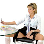 Pic of Stacked mature model Lady Sonia wears transparent pantyhose and high heels