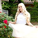 Pic of Huge titted blonde milf Holly Heart is turning here and there and teasing man for hard fuck