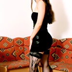 Pic of Brunette Lia Raw in black stockings spreads her legs for blonde to enjoy pussy fisting