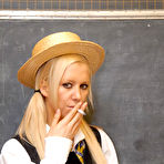 Pic of Naughty schoolgirl in black seamed stockings flashing her curves